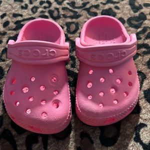 Pink crocs